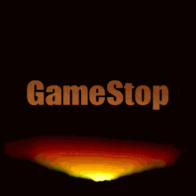 a game stop logo against a sunset sky