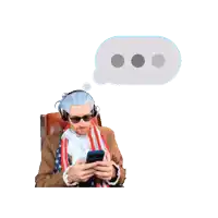 a man wearing a wig and headphones is looking at his cell phone