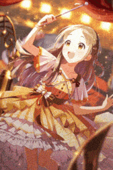 a girl in a yellow and white dress is holding a wand