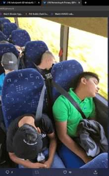 a group of people sleeping on a bus with one wearing a ralph lauren shirt