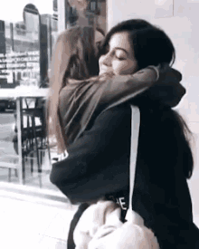 Neyla Rivera Hug GIF - Neyla Rivera Hug Carry GIFs