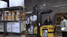 a forklift in a warehouse has the number 90 on the side
