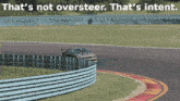 a car is driving on a race track with the words that 's not oversteer that 's intent