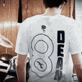 a person wearing a t-shirt that says duff on it