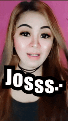 a woman with braces on her teeth and the word josss on her face