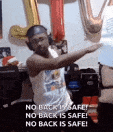 a man wearing headphones is dancing in front of balloons .