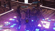a group of people are standing in a room with a shield that says hold