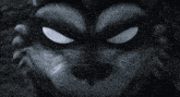 a close up of a person 's face with a few spots on it