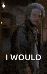 a man with a beard and a jacket is screaming and saying `` i would neva !! ''