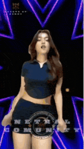 a woman in a crop top and shorts is dancing in front of a sign that says netr community music