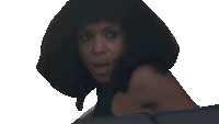 a woman wearing a black hat looks at the camera with a serious look on her face