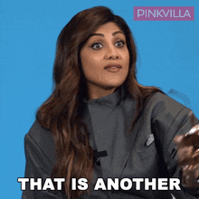 a woman says " that is another " in front of a blue background
