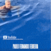 paulo fernando ferreira is the name of the man swimming in the water