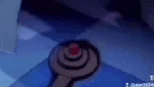 a cartoon drawing of a circle with a red circle in the middle .