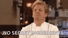 a man in a chef 's uniform is making a funny face and says `` no secret ingredients ! ''