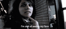 a woman says i 'm sick of seeing my face in a black and white image