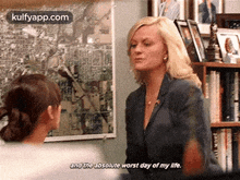 a woman is talking to another woman in a room and the absolute worst day of her life .
