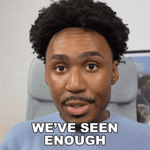 a man says we 've seen enough in front of a picture