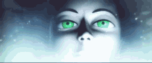 a close up of a person 's face with green eyes looking up into the sky .