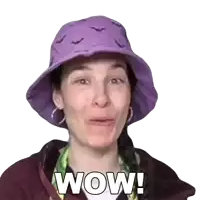 a woman wearing a purple hat says wow