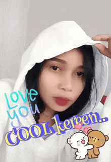 a woman wearing a white hoodie with the words love you cool keren written on it
