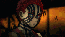 a cartoon character with red hair and black stripes on his face stands in front of a fire