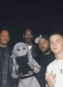 snoop dogg ice cube and eminem pose for a picture together