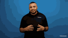 a man wearing a black shirt with miami on it