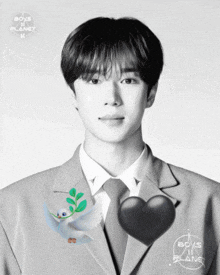a black and white photo of a man with a heart and the words boys on planet
