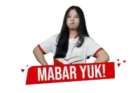 a girl making a funny face behind a sign that says ' mabar yuk '