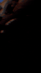 a lightning bolt strikes against a dark sky