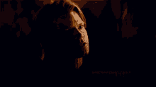 a man and a woman are kissing in a dark room with mariephantom wear a blur written on the bottom