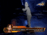 a man in a white bodysuit is on a television screen with the name morfo on it