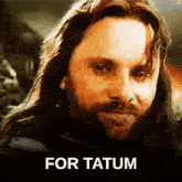 a close up of a man 's face with the words " for tatum " below him