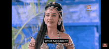 a woman in a blue dress is talking about what happened .