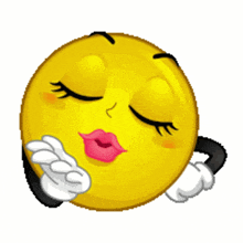 a cartoon smiley face is blowing a kiss with a red heart above its eyes