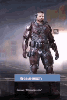 a man in a military uniform is standing in front of a sign that says ' независимость ' on it