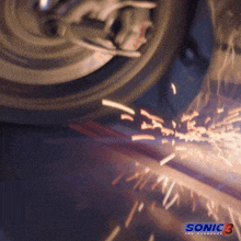 a close up of a motorcycle wheel with sonic 3 on the bottom right
