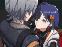 a boy and a girl are standing next to each other and looking at each other .