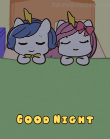 a cartoon of two unicorns laying on a bed with the words good night