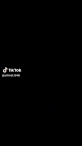 a man in a camouflage jacket is holding a gun and has tiktok written in the lower right corner