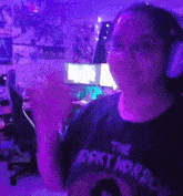 a woman wearing a shirt that says the rocky horror on it