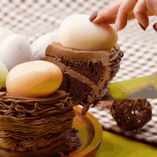 a person is cutting a slice of chocolate cake with eggs on top
