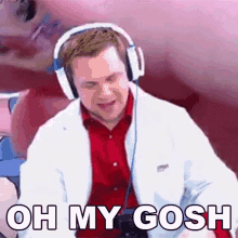 a man wearing headphones and a lab coat is making a funny face and saying oh my gosh .