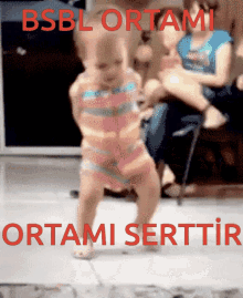 a picture of a baby dancing with the words bsbl ortami ortami serttir