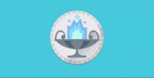 a coin with a flame in it and the word tails on the bottom