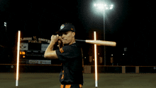 a baseball player wearing a jersey that says mercer on it