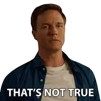 a man in a blue shirt has the words that 's not true on his face