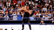 The Undertaker Tombstone Piledriver GIF - The Undertaker Tombstone Piledriver Johnny Stamboli GIFs
