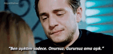 a man is crying in front of a woman and says " ben asiktim sadece "